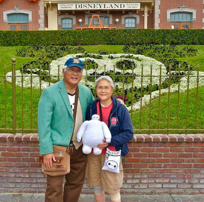 9. Hiro & Tadashi Hamada with Baymax from Big Hero 6