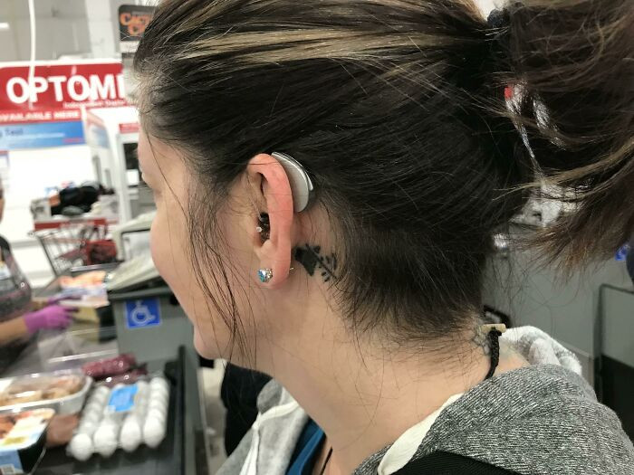 32. This Hearing Impaired Persons Tattoo Next To Her Hearing Aid