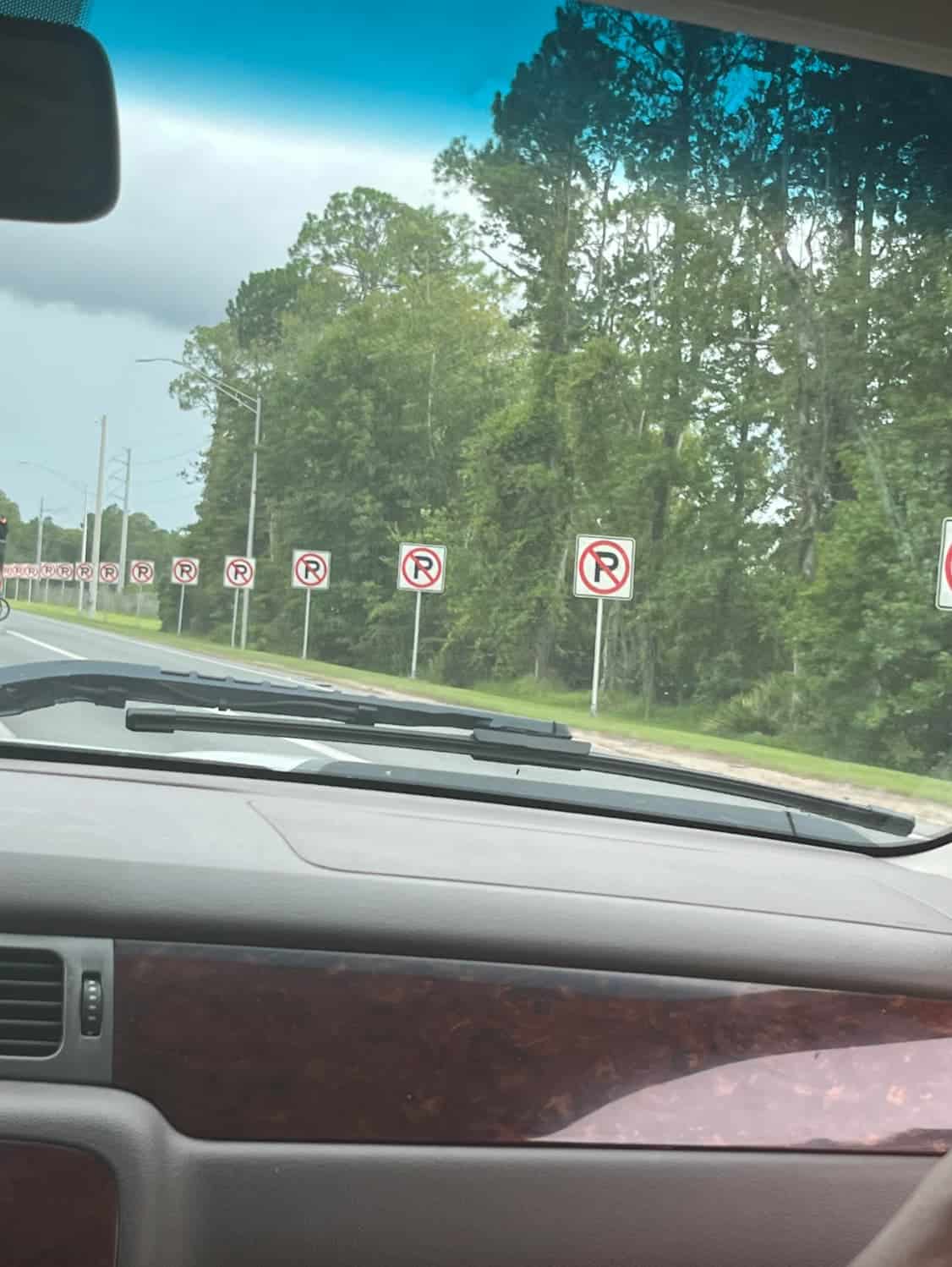 3. “This endless no parking sign (at least 100 more not in the picture) found in Florida.”