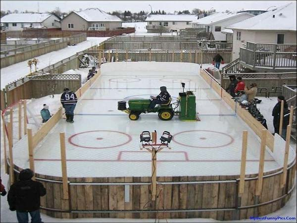 12. An Ice Hockey Rink: Lace up those skates and grab that hockey stick as you glide across your very own backyard hockey paradise. Oh, and a Zamboni is a must for this one.