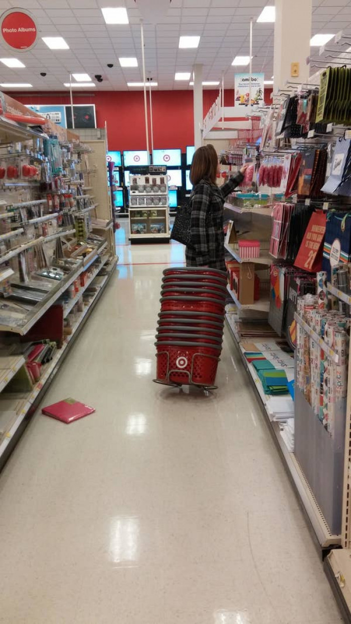 11. This woman took the whole cart stand: