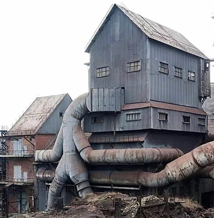 45. Viktor Macha captures the allure of Donetsk, Ukraine, admiring the figurative appearance of the piping as it embraces the structure.