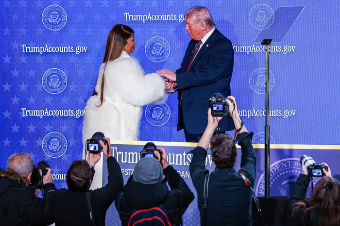 Nicki Minaj speaking at an event, reflecting on immigrant roots and advocacy