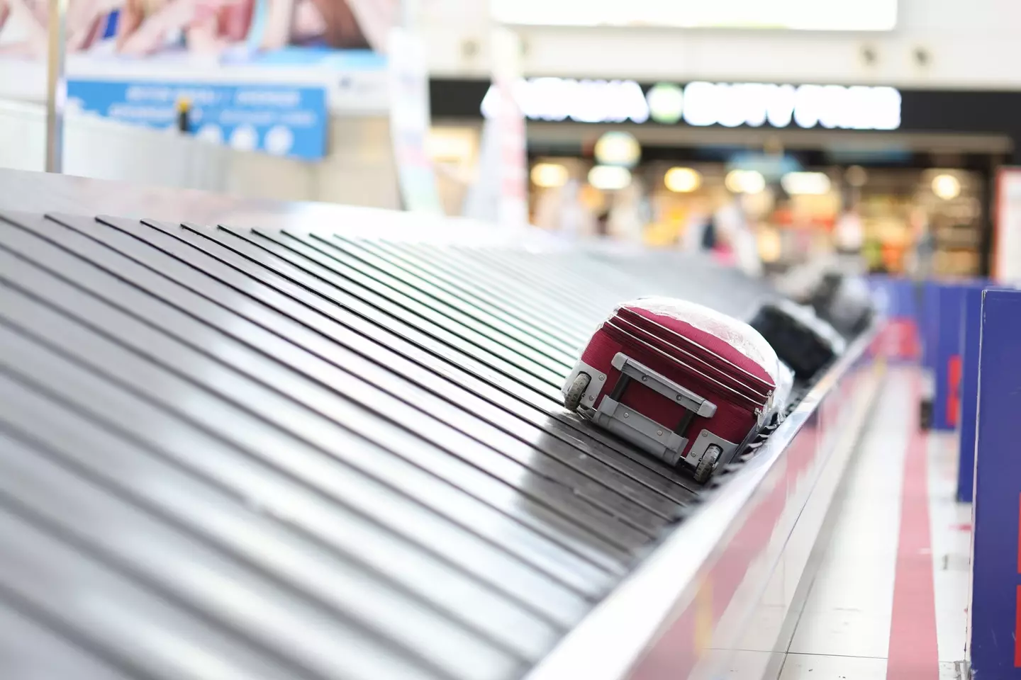 Always Place Your Suitcase on the Conveyor Belt with the Wheels Facing Up.