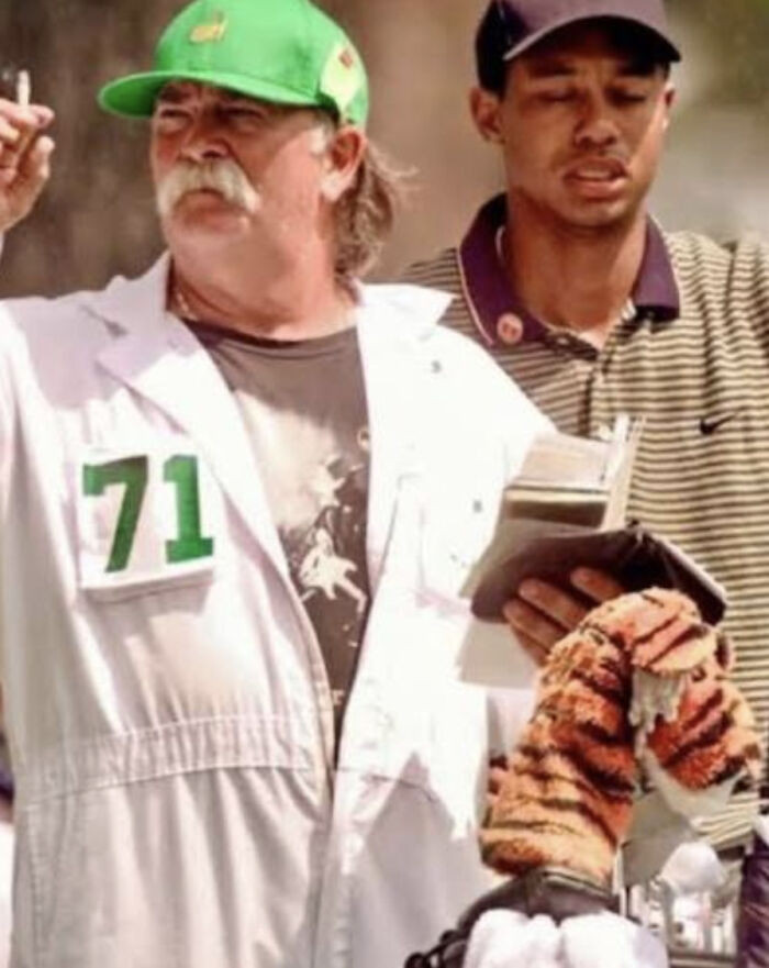 ”Tiger Woods' Caddie Checking The Wind With His Cigarette At The 1997 Masters”