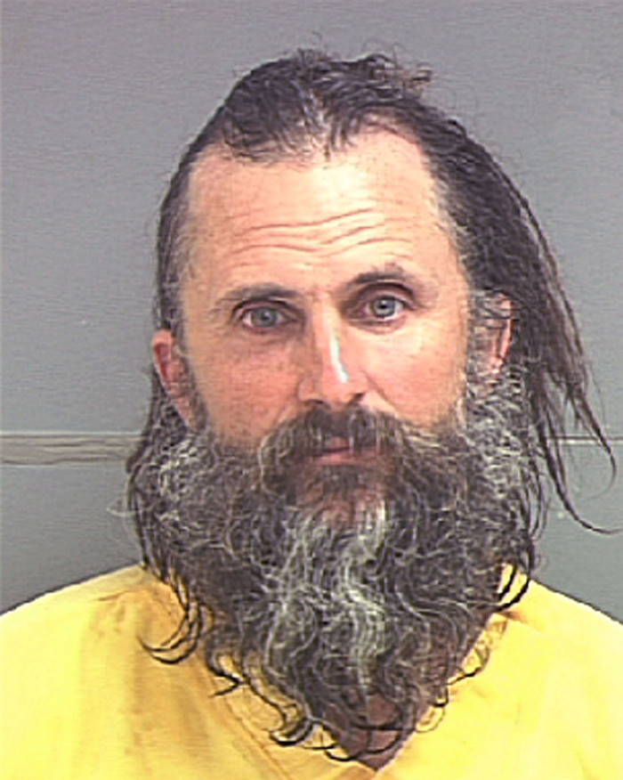 Elizabeth’s resilience story, survivor facing captivity and abuse, determined expression