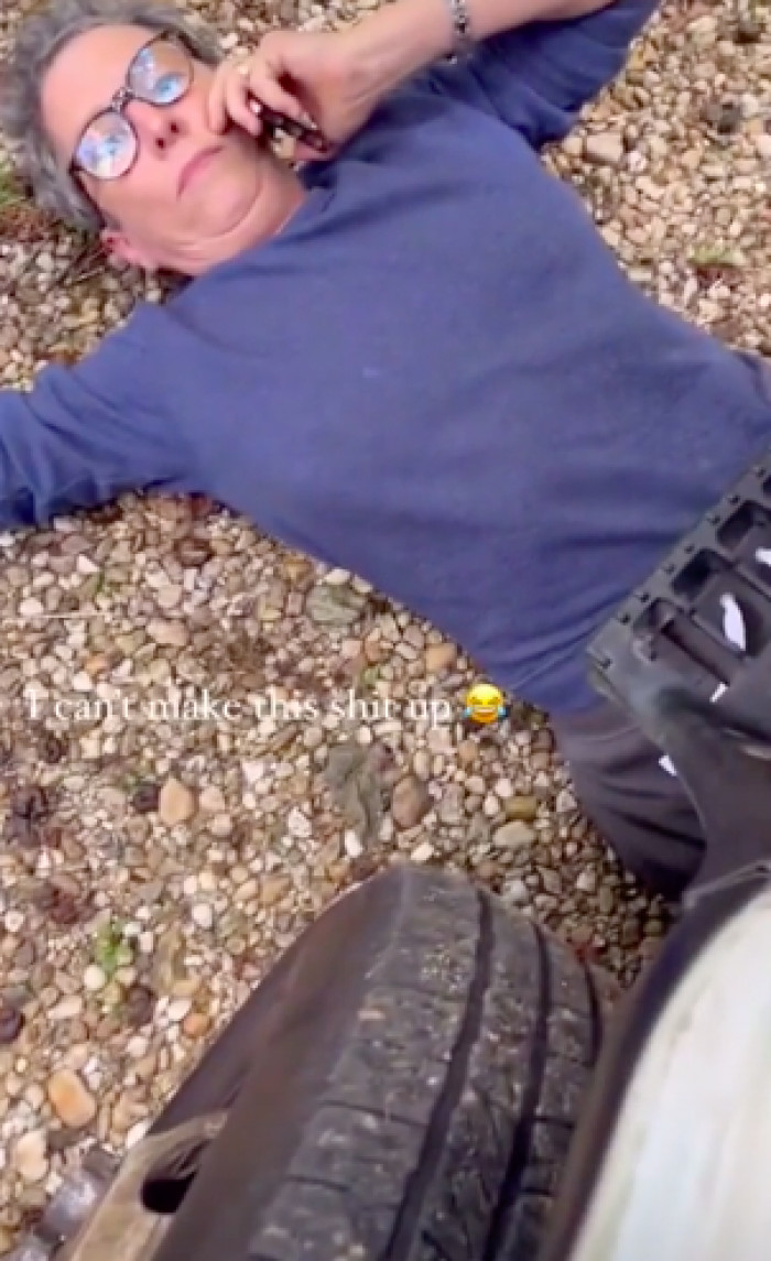 One psychotic Karen lay in front of the wheels as if protesting for some mighty cause