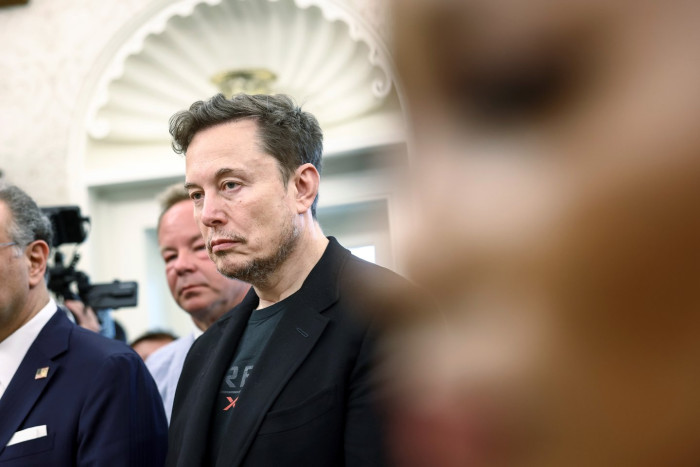 Elon Musk speaking at an event, discussing energy demand and power needs.