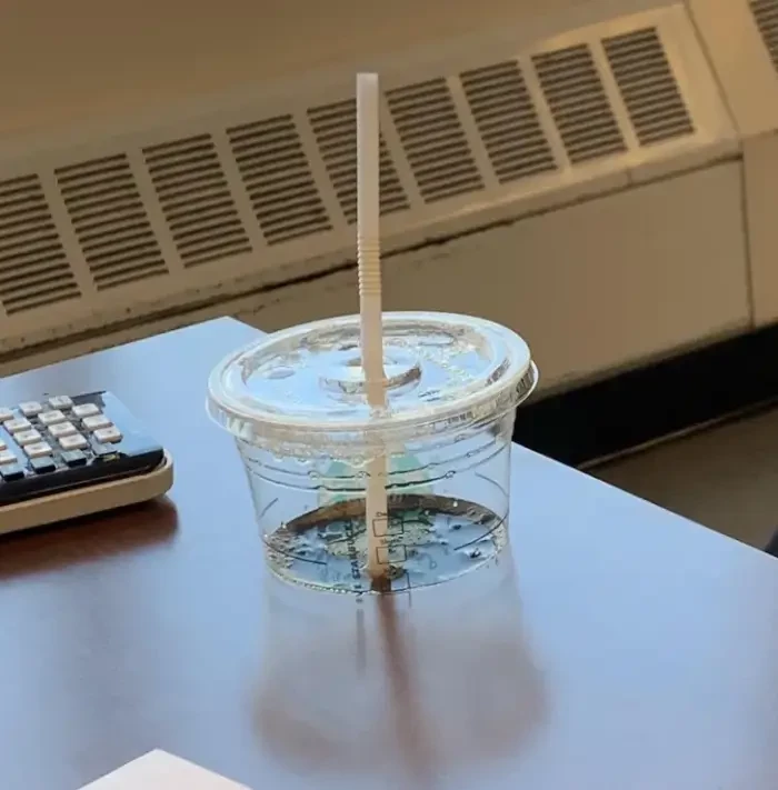 20. The cup doesn't look like it's on this table's cup holder.