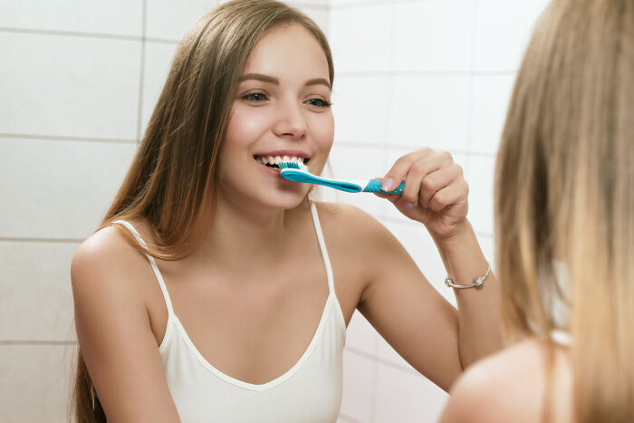"Was brushing my teeth and went to throw something away but ended up spitting all over the floor instead."