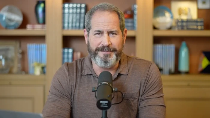 Heart surgeon in his 50s discussing heart health after heart attack