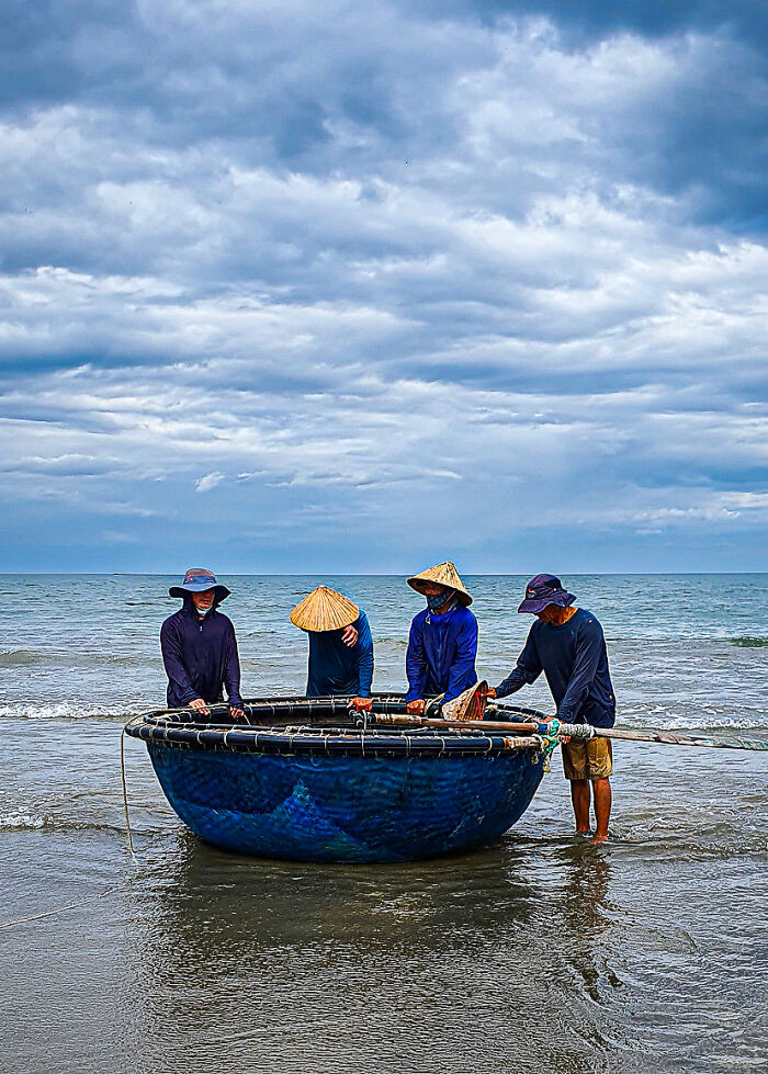 On The Phone In Support Of Action Against Hunger: Timeless Teamwork Traditions - Basket Boat Fishing, Da Nang, Vietnam By Laura Burgon