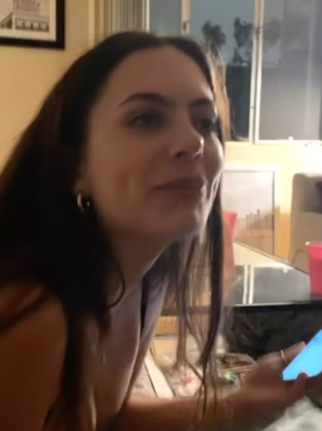 Here is a screenshot from the video, and the woman is Maddie