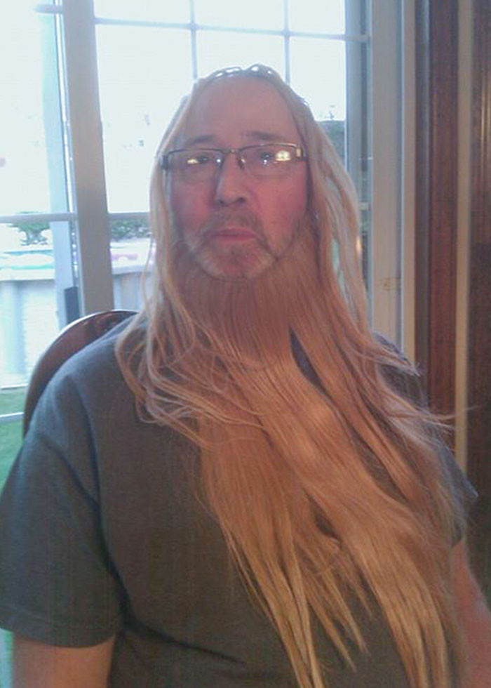 40. This cool uncle who posed with his cousin's hair extensions!