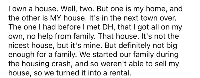 The OP owns two houses: the one she and her family live in, and the one she lived in before she got married.