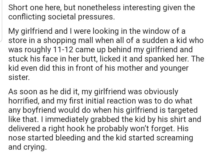 OP's girlfriend was groped by a kid while they were out together, which led him to punch the boy on the nose