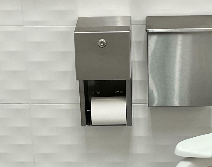 'Noticed This Face In The TP Holder While Washing My Hands'