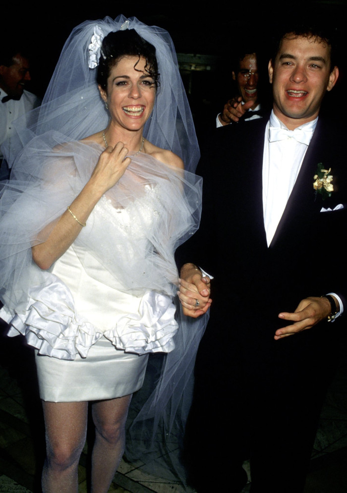 Tom Hanks and Rita Wilson together, smiling at a formal event