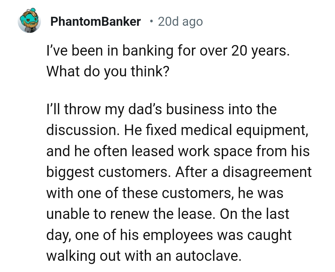 16. One of the employees walking out with an autoclave