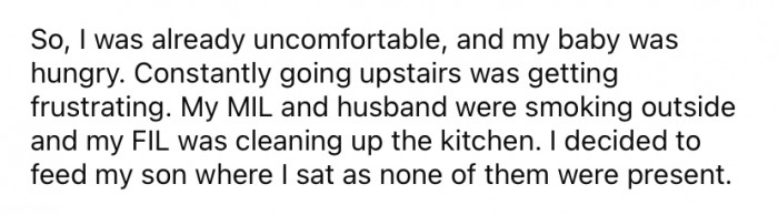 While everyone was busy, she decided to quickly nurse the baby where she was sitting.