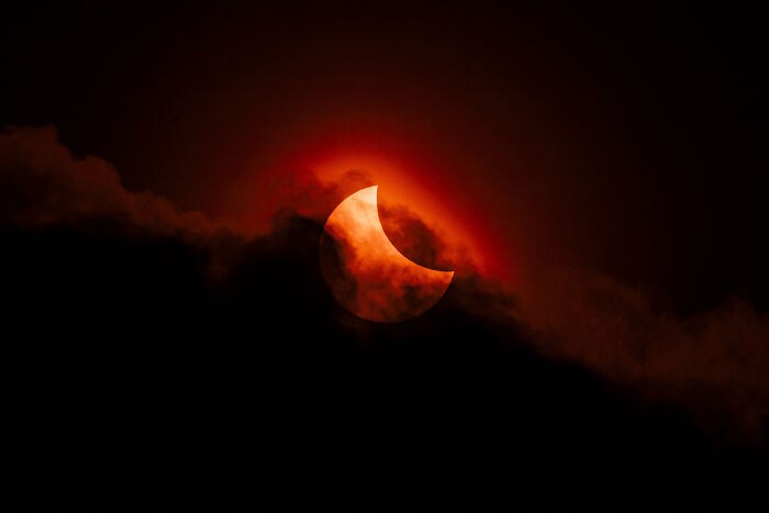 “Moody Partial Solar Eclipse” By James Mcbeath