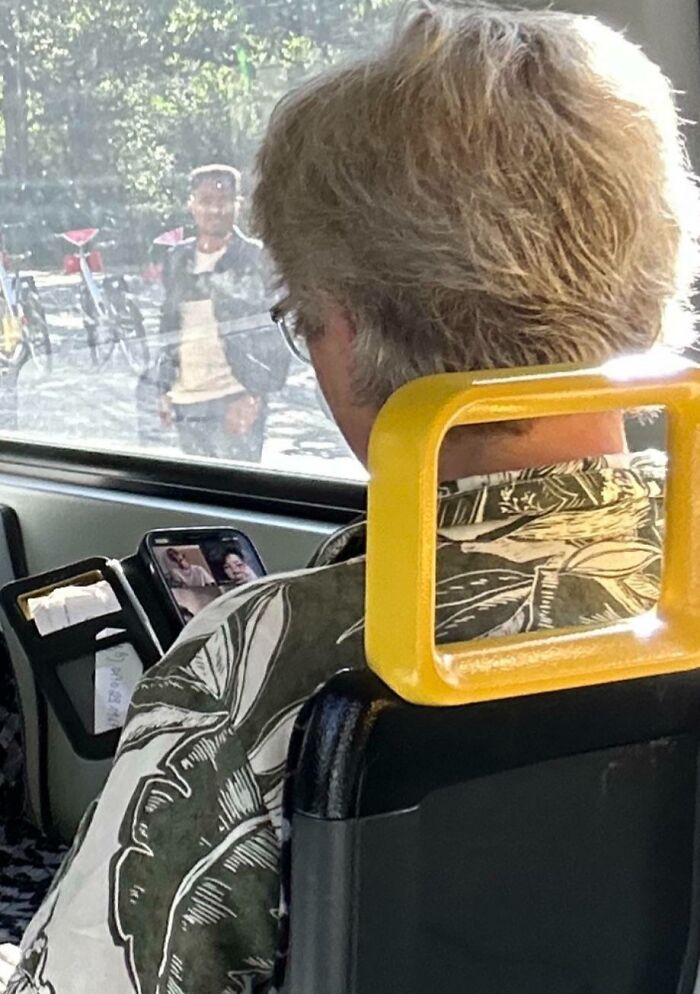 "Woman Having Work Zoom Call In The Train With No Headphones"