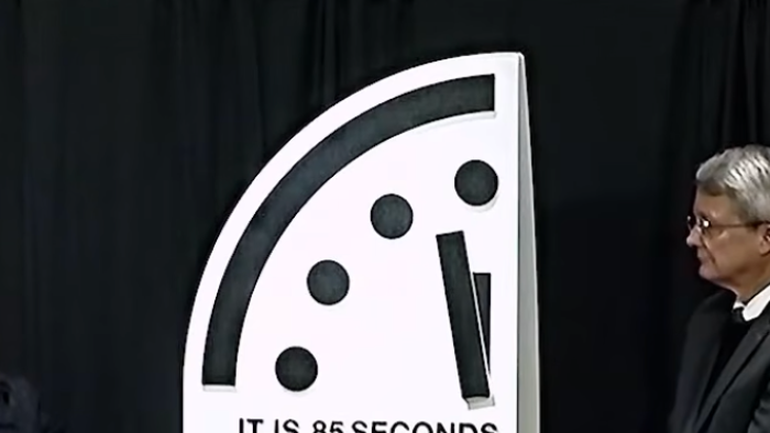 Doomsday Clock dial marked near midnight, highlighting 85 seconds remaining