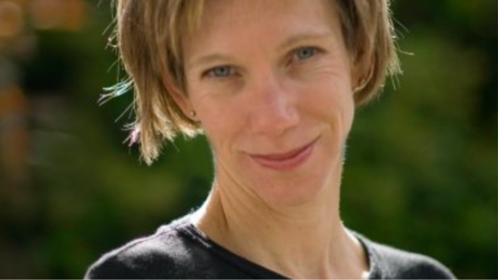 Beachgoers near shore during shark incident aftermath, triage and missing swimmer search.