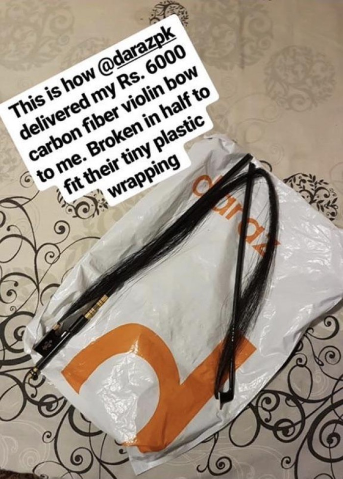4. This person couldn't care less if a violin bow was broken to fit their compact packaging: