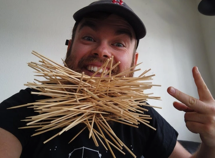 18. “Got bored and poked 165 skewers into my beard.”