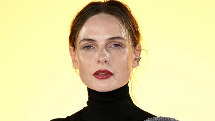 Rebecca Ferguson attends a press event, addressing co-star name rumors and misconduct.