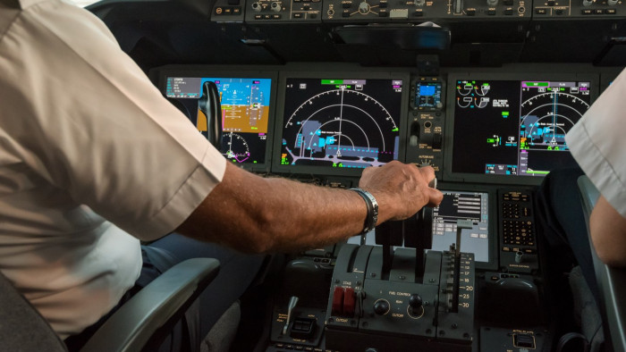 Pilot checks sky for unexpected objects, referencing satellite and sunlight effects