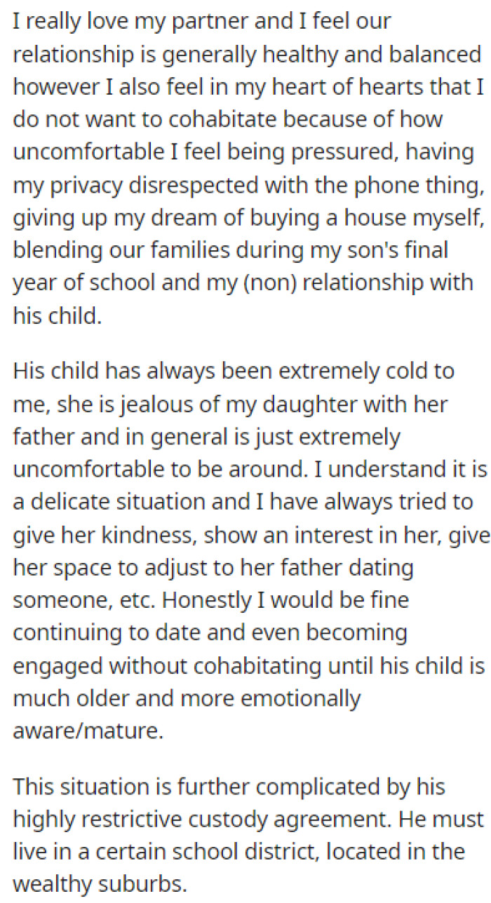 OP loves her partner, but she doesn't want to live with him yet