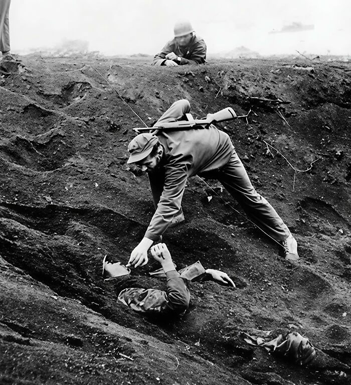 "Us Marine Approaches A Japanese Soldier On Iwo Jima, March 16, 1945"