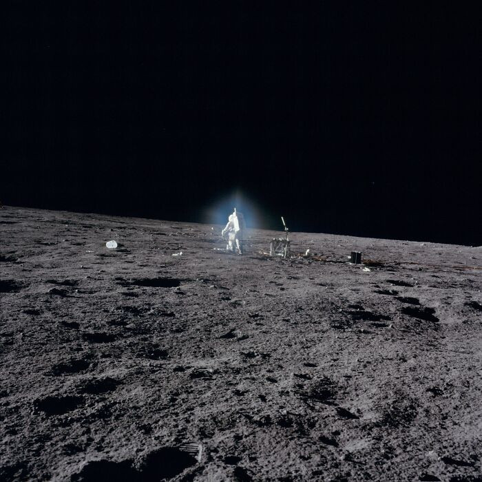 "Astronaut Bean Deploys ALSEP Central Station"