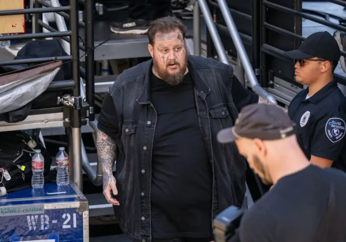 Jelly Roll and Bunnie Xo together, discussing his major weight loss transformation