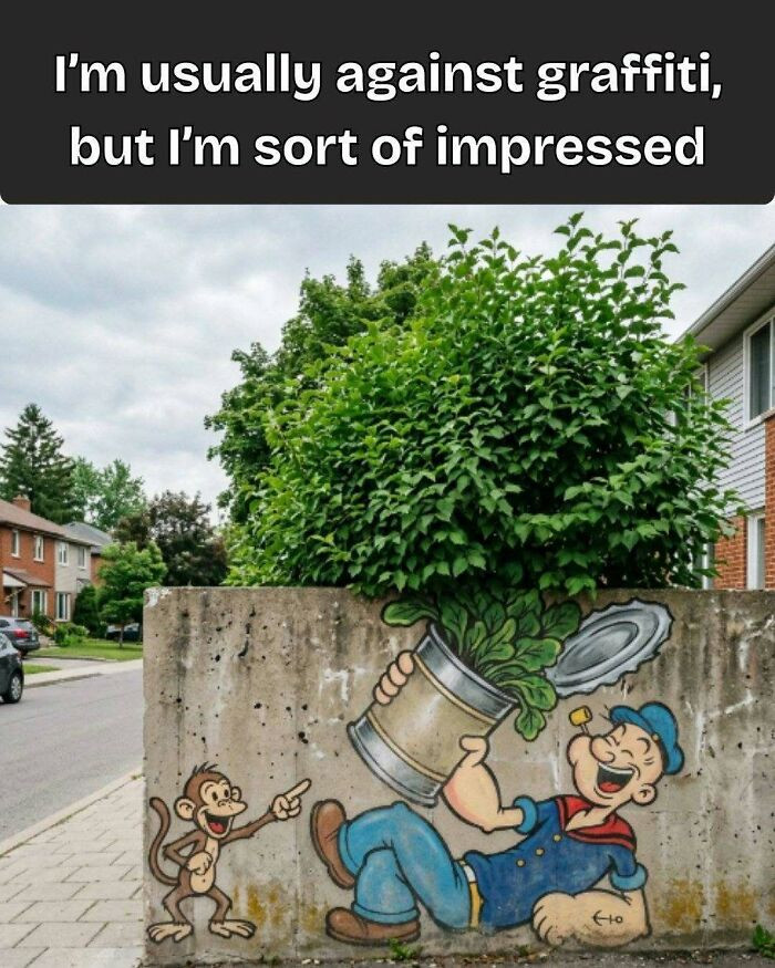 "Turning A Real Bush Into Popeye’s Spinach Can Is Honestly Pretty Clever — Whoever Painted This Understood The Assignment"