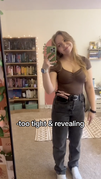 Looking at the girl's pictures, it really doesn't seem like she's wearing anything inappropriate, so it's interesting that they claimed it was too tight or revealing.