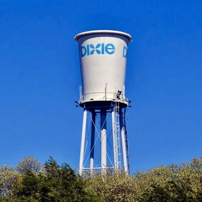 "This Is The Famous Dixie Cup Water Tower, A Unique Landmark Located In Lexington, Kentucky. It Is Designed "To Look Exactly Like A Giant Disposable Dixie Cup, Complete With The Brand's Logo And The Signature Rim At The Top""