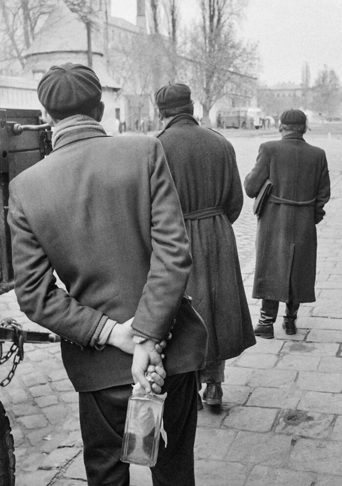 "An Anti-Communist Revolutionary Holds A Molotov Cocktail Behind His Back During The 1956 Hungarian Revolution"