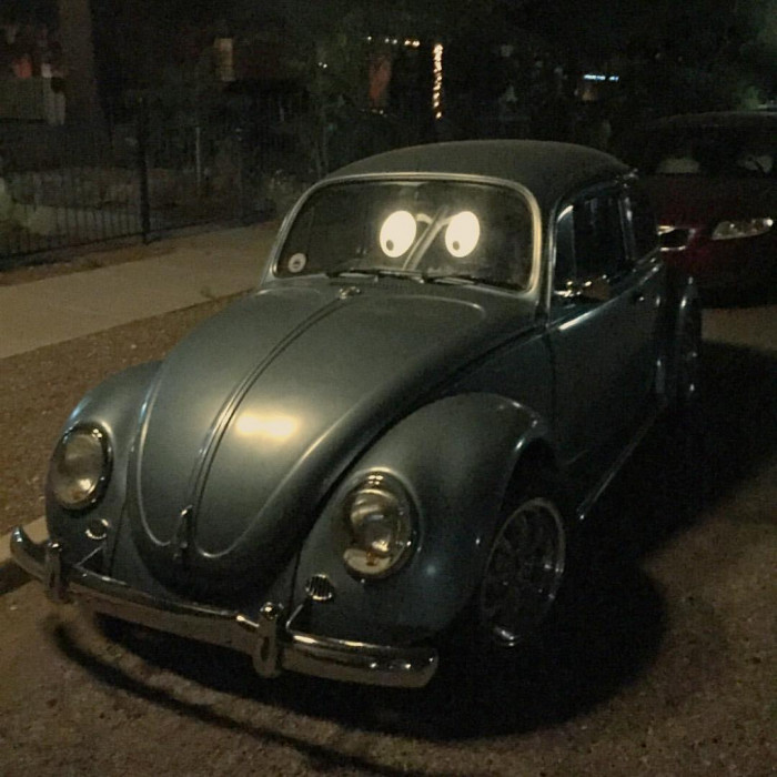 2. The reflection from the street lamps makes this VW bug look like it has cartoon eyes