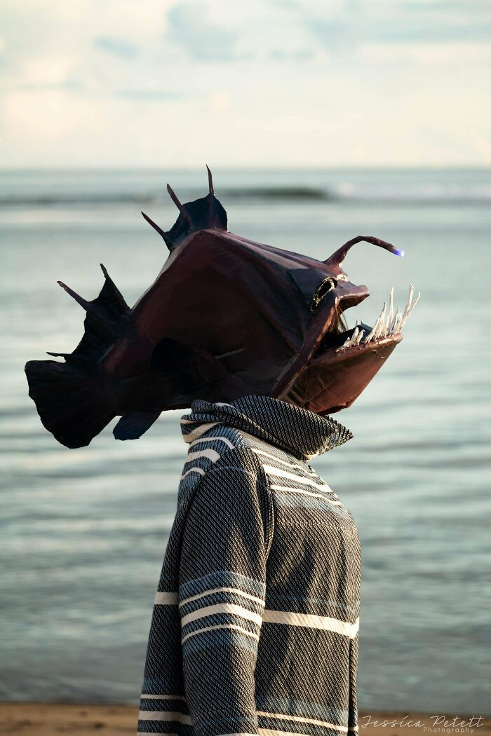 "A Cardboard Fish Head And Jacket"