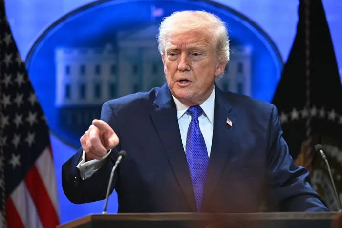 Donald Trump speaks during political debate about Bill Clinton deposition testimony.