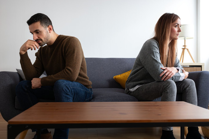 Couple discussing relationship challenges during winter reflections after the holidays