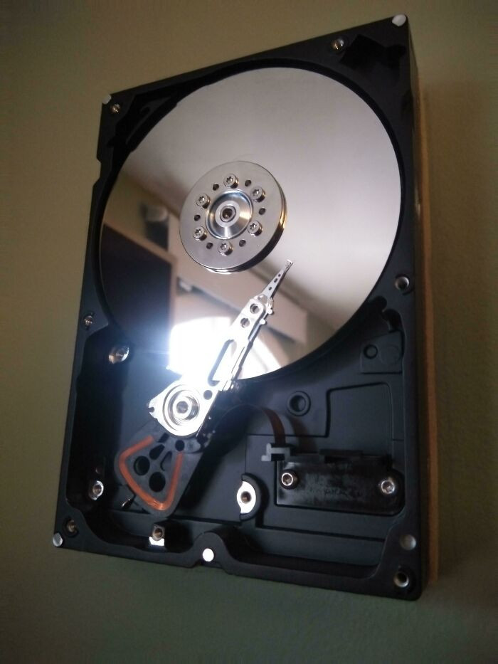 "I Made Wall Hangings Out Of Disassembled Hard Drives! I Have 2. [4672 X 3504] [oc]"