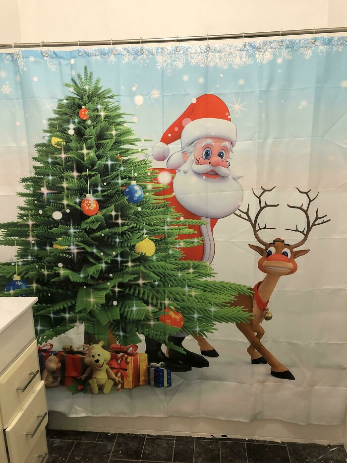 "The Positioning Of Santa And Rudolph On Our New Shower Curtain"