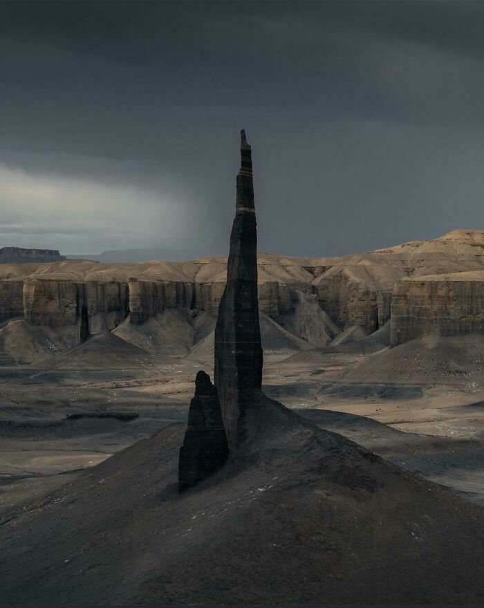 32. This Dark Obelisk In The Desert