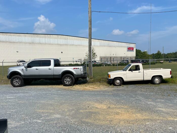 "My Ford Ranger Compared To My Coworker's Ford F350. My Truck Is The Height Of His Windows"