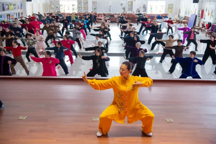 Person performing Baduanjin, a traditional Chinese wellness exercise routine