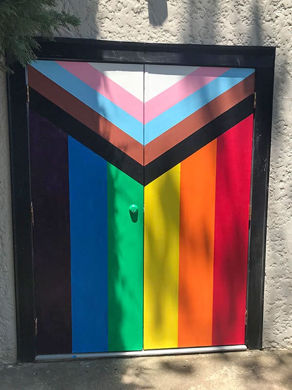 31. “Some Guy Spraypainted Some Very Explicit Anti-Gay Slurs On A Garage Down The Street (A Gay Couple Live There), So Our Neighborhood Got Together And Painted This”